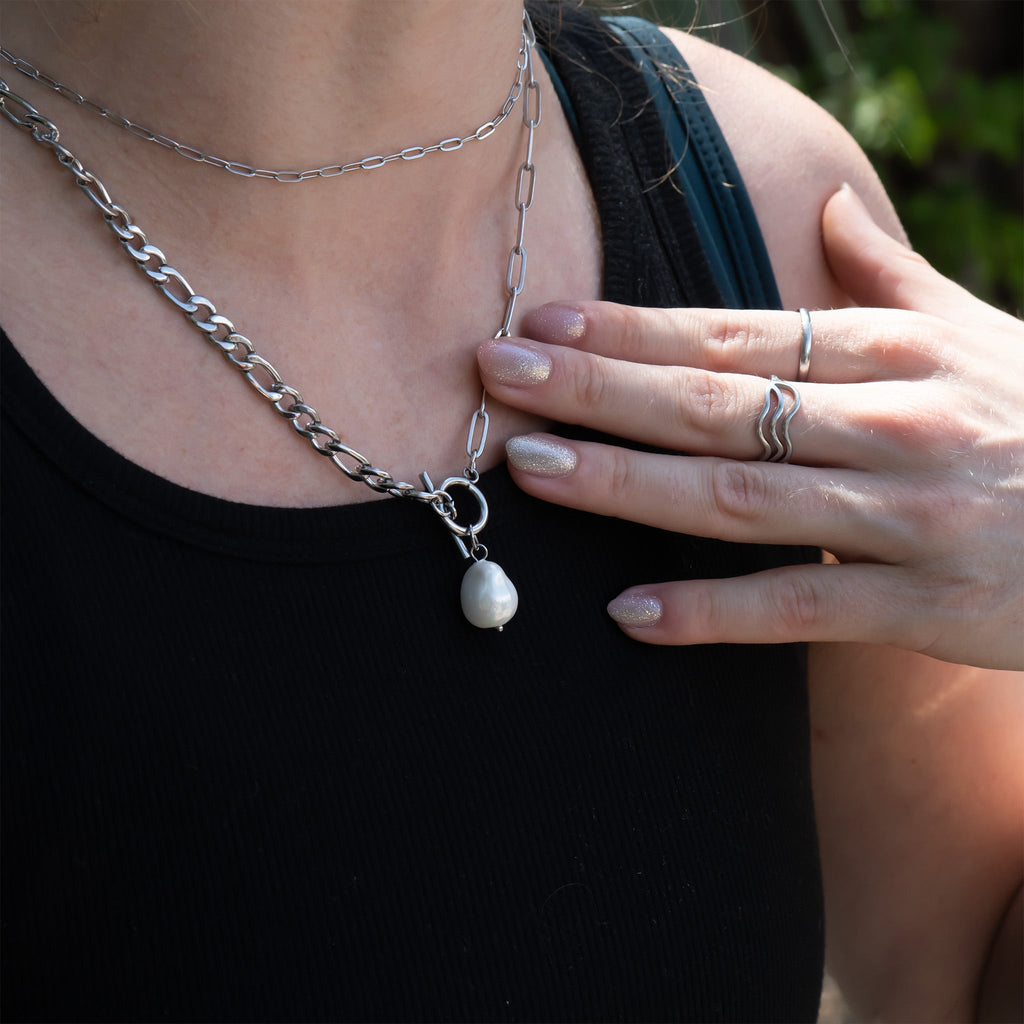Silver pearl carabiner necklace worn on model