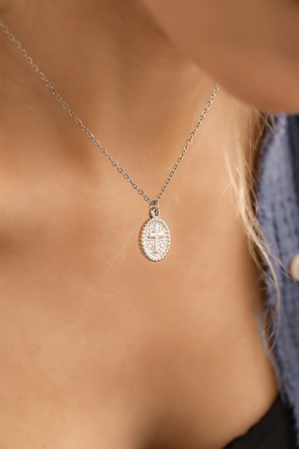 Textured Medallion Cross Charm on necklace