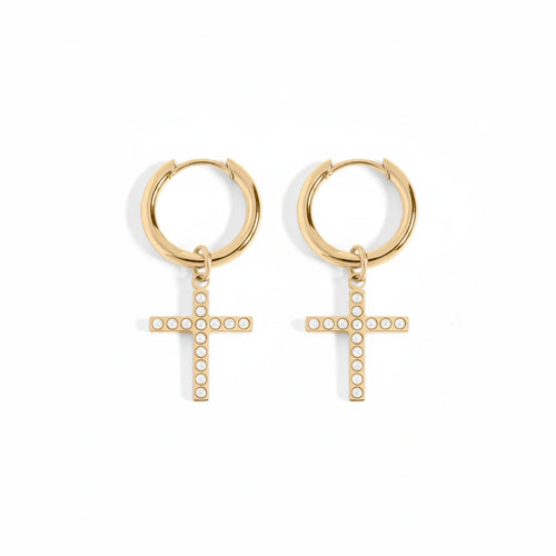 A pair of gold hoop earrings with dangling cross charms, each adorned with small clear stones, shown on a clean white background.