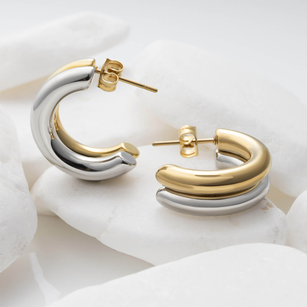 Mixed metal side-by-side huggie earrings styled photo