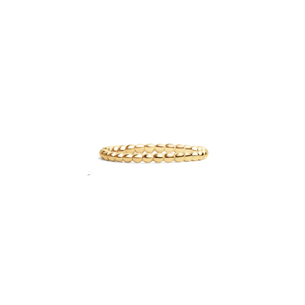 A delicate gold ring with a textured, beaded or rope-like surface detail, centered on a plain white background.