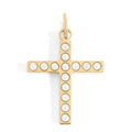 Gold cross pendant with pearls on a white background
