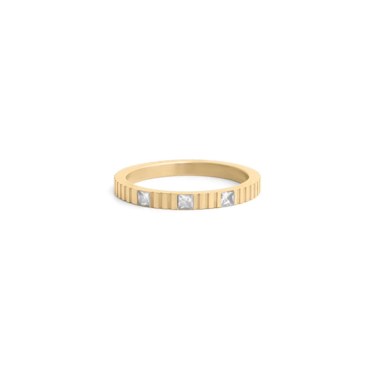 Nicole Stacking Ring in silver with sculptural interlocking band and sparkling stone accent, shown on a white background from Garden District Jewelry