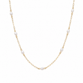 The Josephine Street Station Pearl Necklace in gold, a long-length pearl station necklace from Garden District Jewelry.