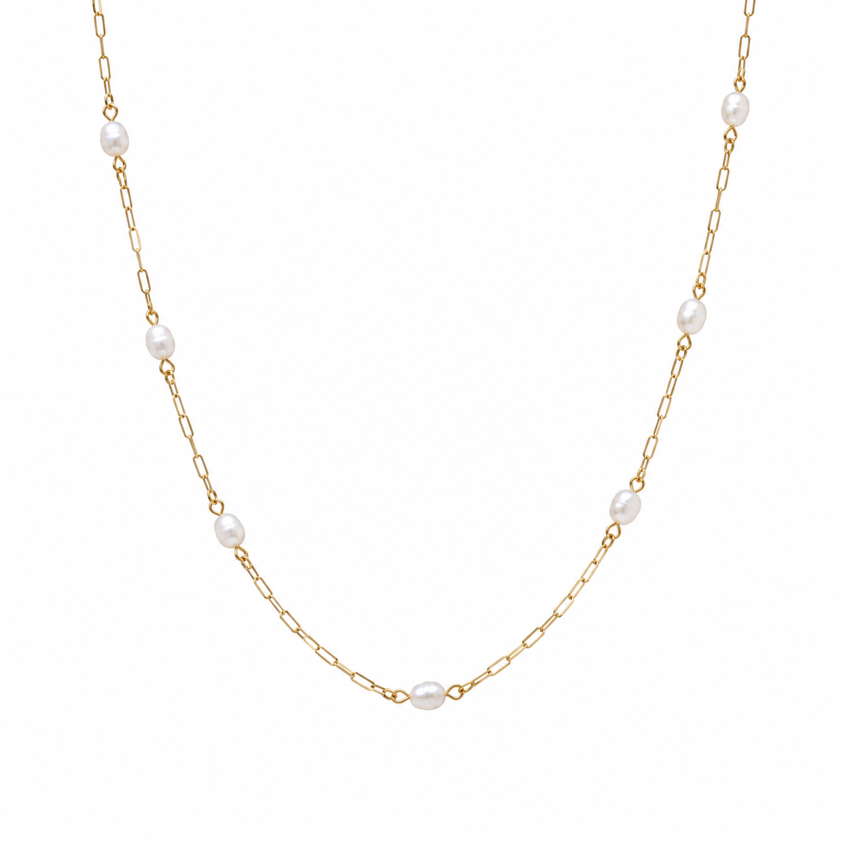 The Josephine Street Station Pearl Necklace in gold, a long-length pearl station necklace from Garden District Jewelry.