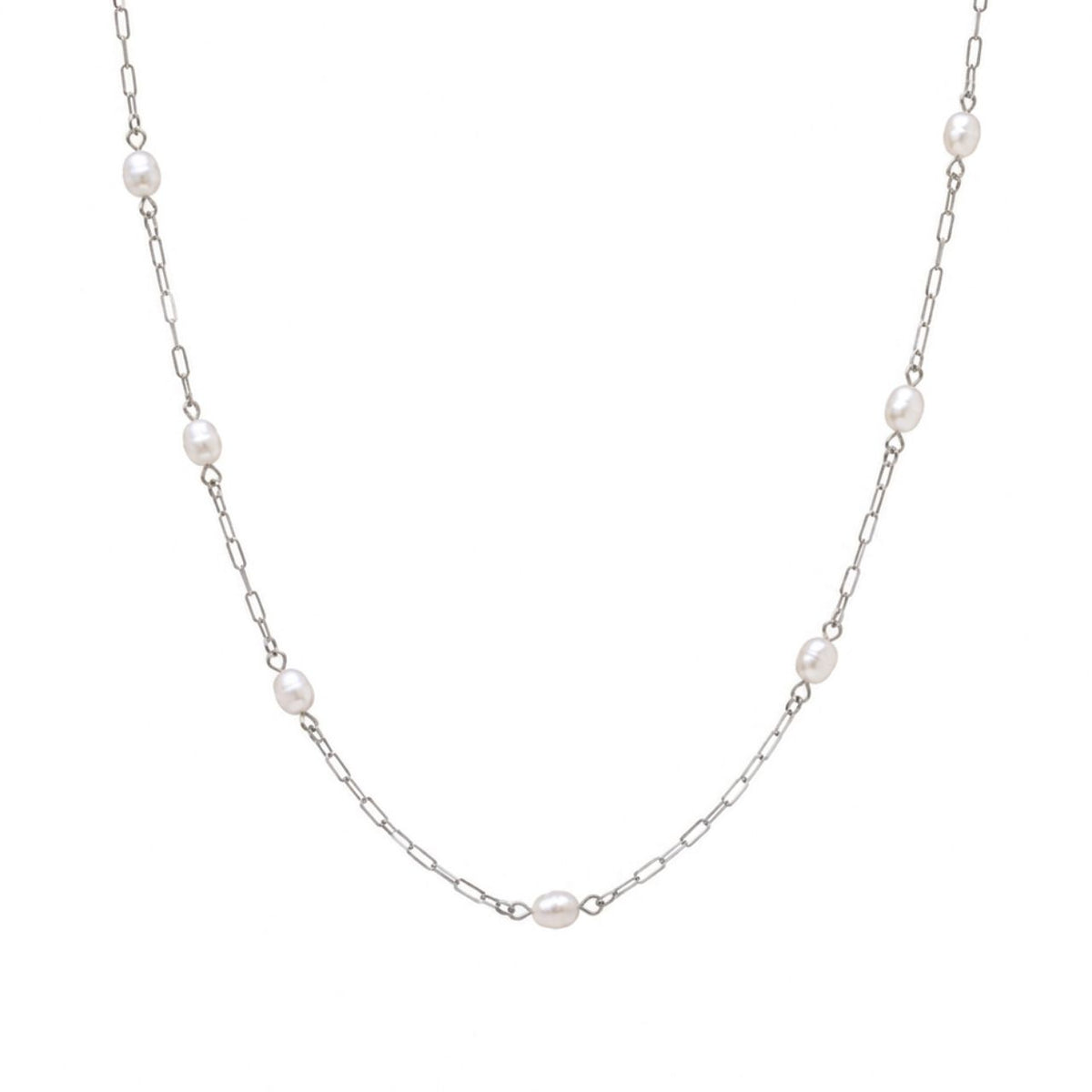 A delicate silver chain necklace featuring evenly spaced, irregular white freshwater pearls, displayed on a clean white background.