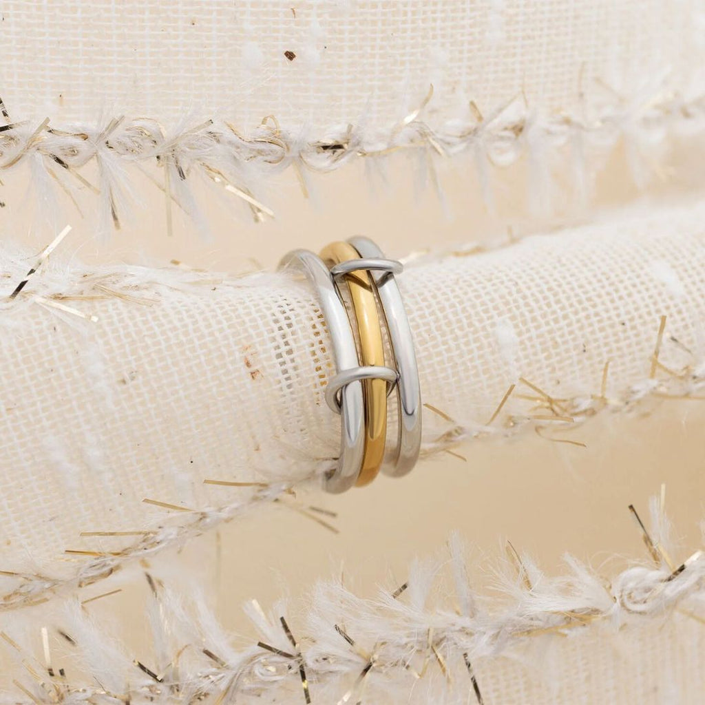 Camp Street Mixed Metal Triple Intertwined Ring, a two-tone gold and silver ring from Garden District Jewelry — product photo 4 of 4.