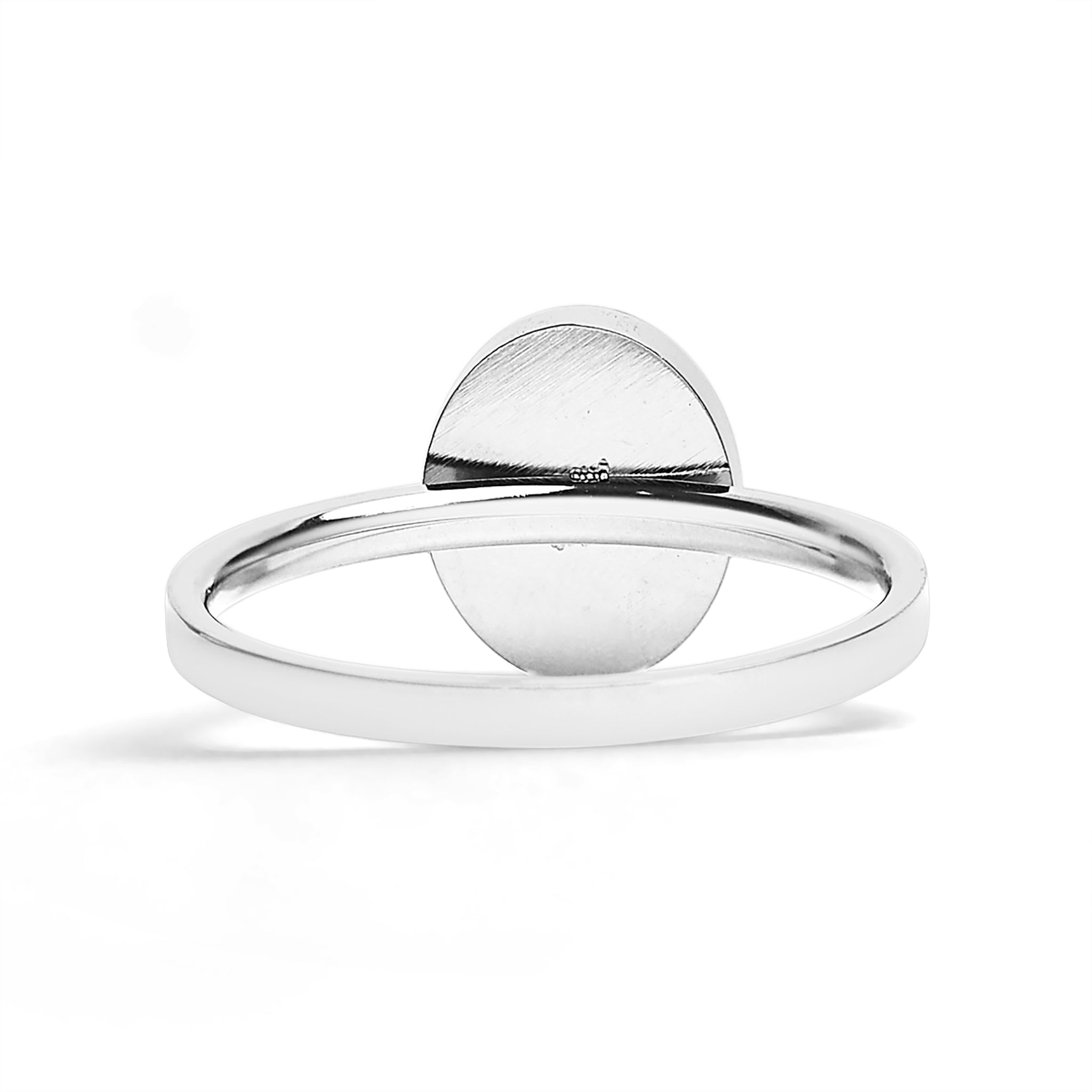 Silver ring with a half-circle design on a white background
