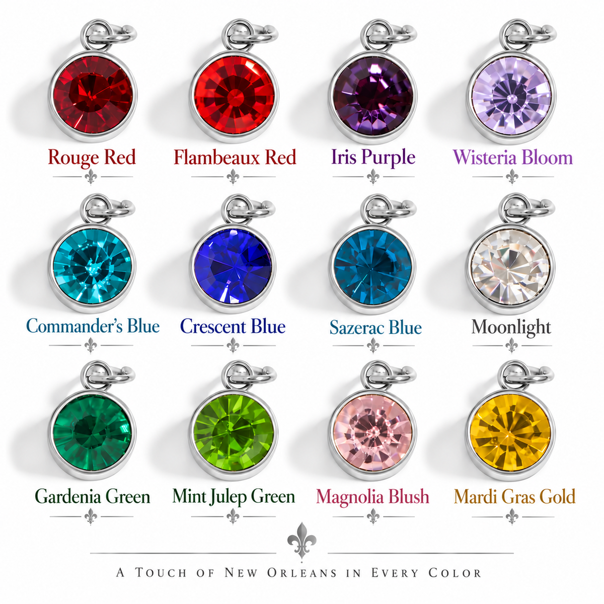 A 3x4 grid of 12 oval pendant charms with silver-tone settings and faceted gemstones in different colors, each labeled with its name such as Rouge Red, Flambeaux Red, Iris Purple, Wisteria Bloom, Commander's Blue, Crescent Blue, Sazerac Blue, Moonlight, Gardenia Green, Mint Julep Green, Magnolia Blush, and Mardi Gras Gold. Text at the bottom reads 'A TOUCH OF NEW ORLEANS IN EVERY COLOR' with a fleur-de-lis.
