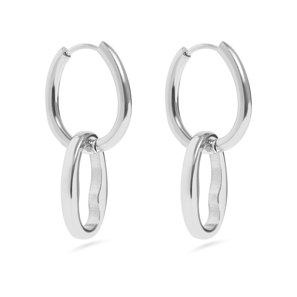 Pair of silver hoop earrings on a white background
