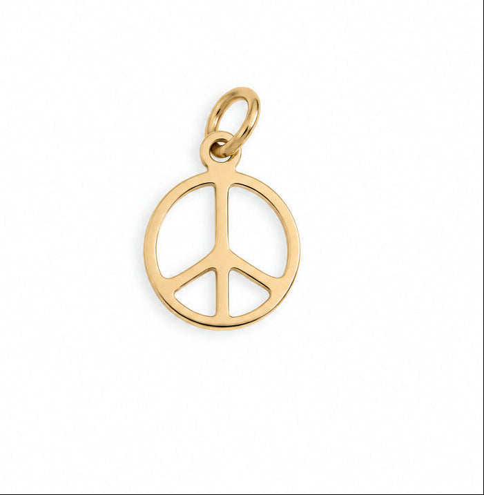 Gold peace symbol pendant on a white background