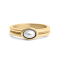 Gold ring with a central pearl on a white background