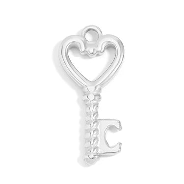 A silver key-shaped charm with a heart-shaped cutout at the top and a textured, twisted handle, shown on a plain white background.