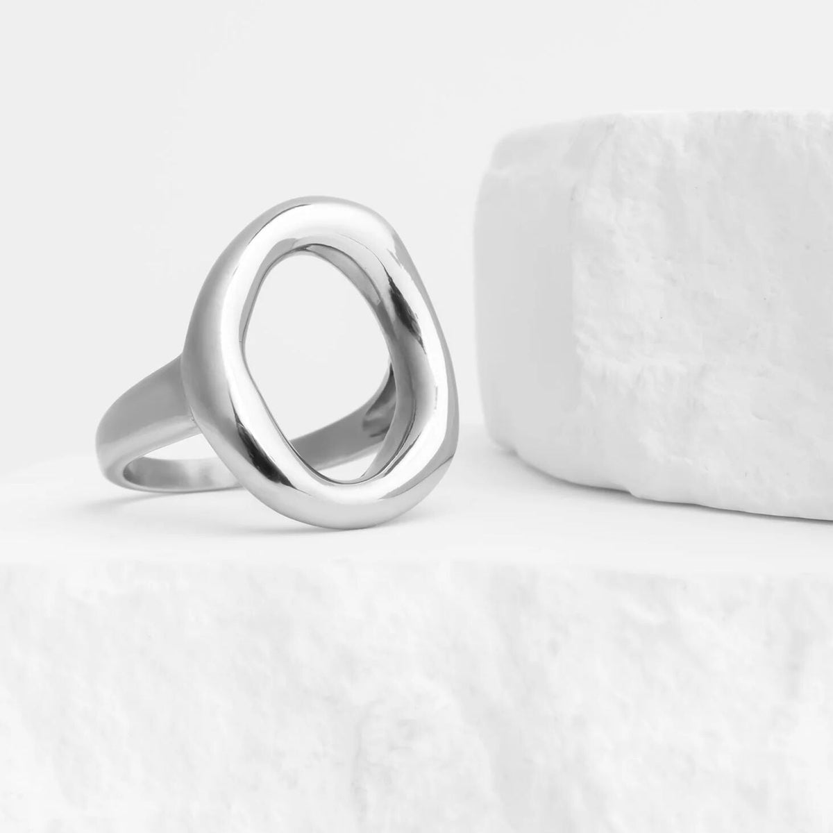 Silver ring on a white background
