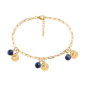 Evil Eye Coin and Sodalite Charm Bracelet in gold, featuring blue sodalite beads and gold evil eye charms, from Garden District Jewelry.