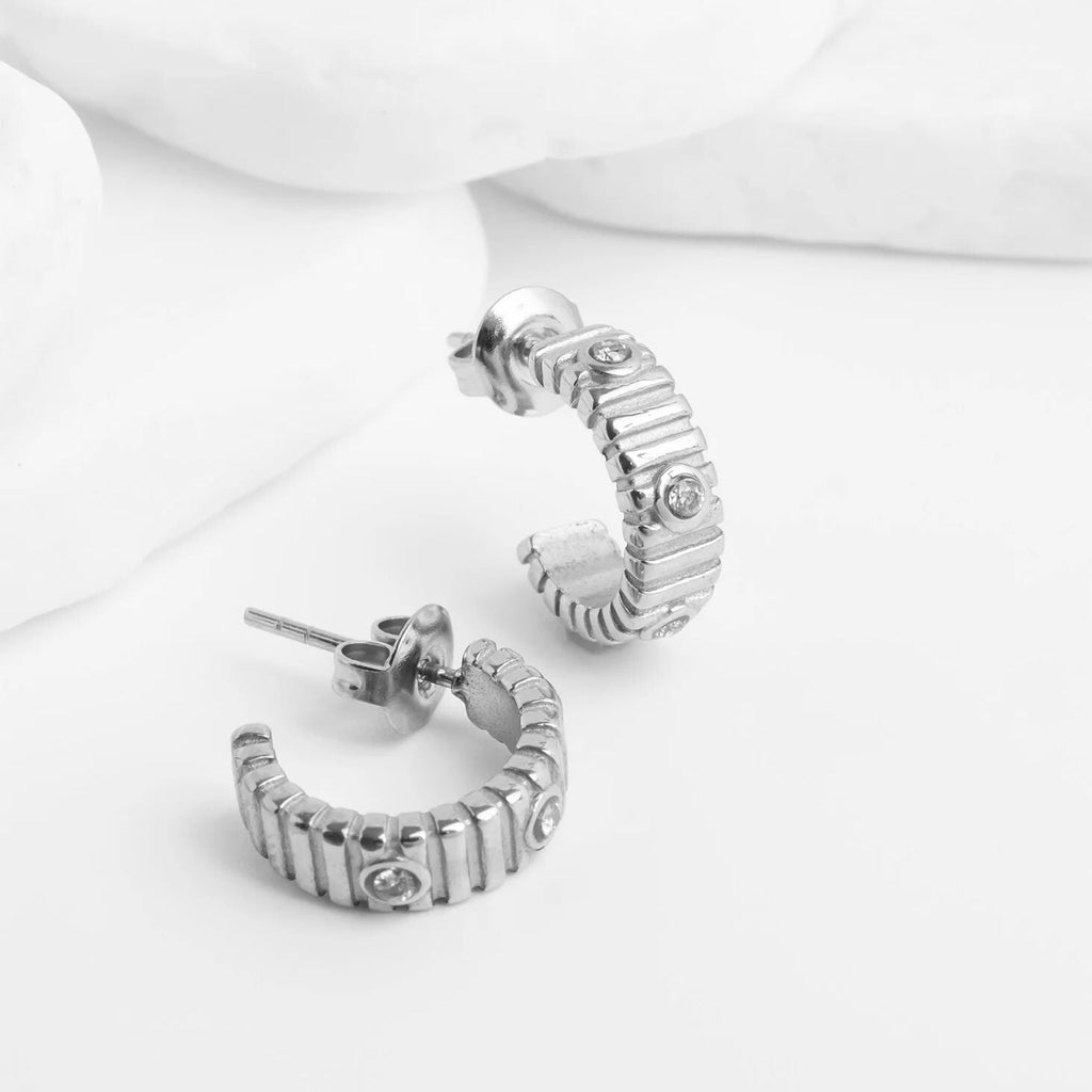 The Coliseum Fluted Huggie Earrings