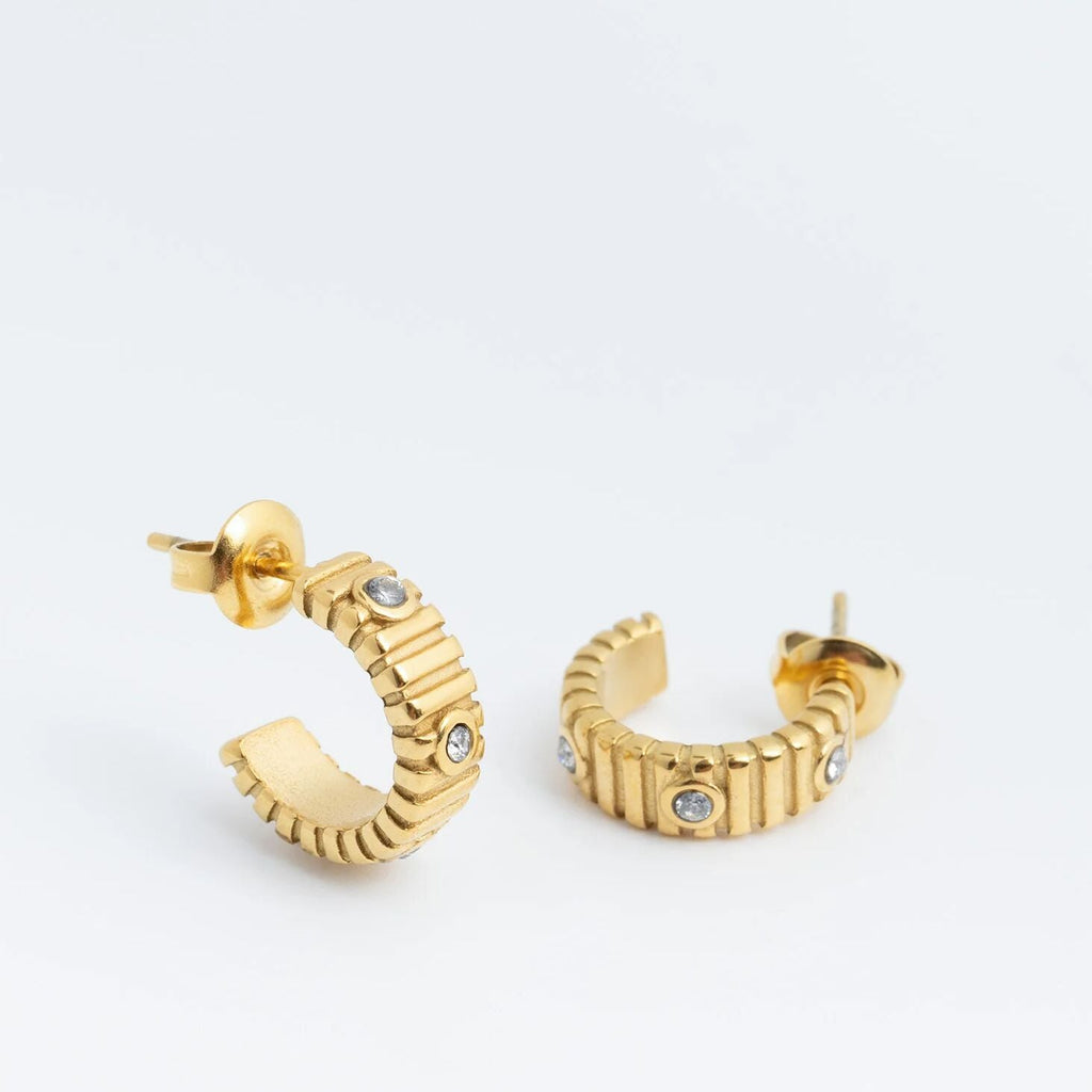 The Coliseum Fluted Huggie Earrings