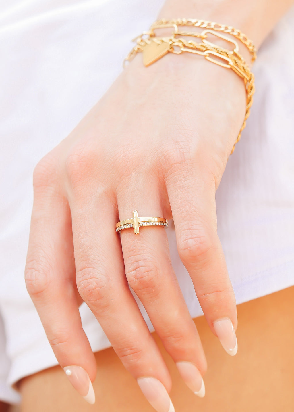 Cathedral Cross Ring with Stones, a gold cross ring set with cubic zirconia stones, from Garden District Jewelry — product photo 5 of 11.