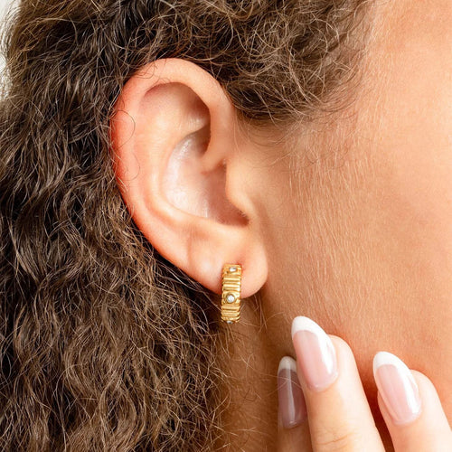 The Coliseum Fluted Huggie Earrings