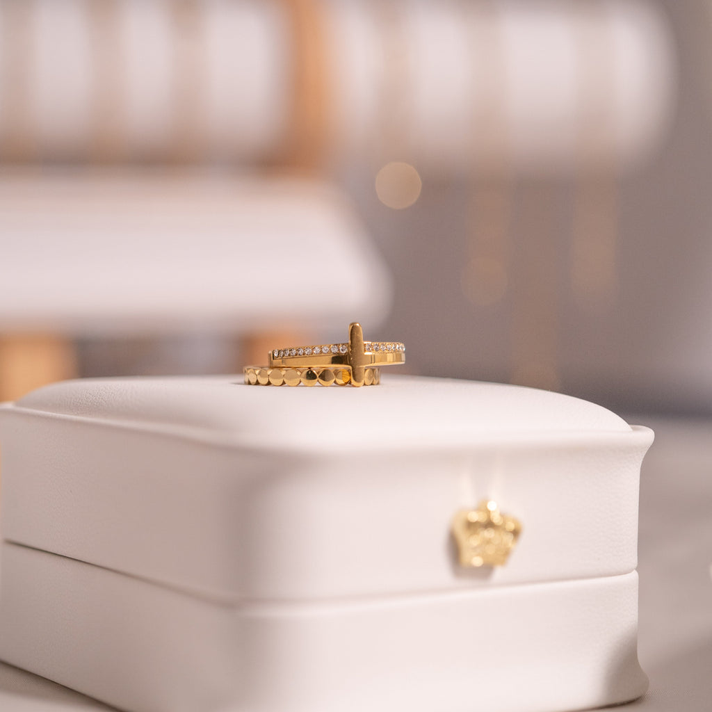 Cathedral Cross Ring with Stones, a gold cross ring set with cubic zirconia stones, from Garden District Jewelry — product photo 8 of 11.