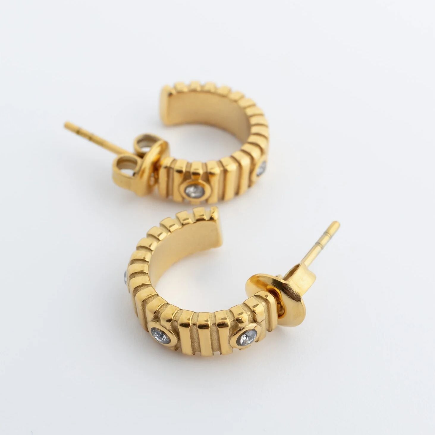 The Coliseum Fluted Huggie Earrings