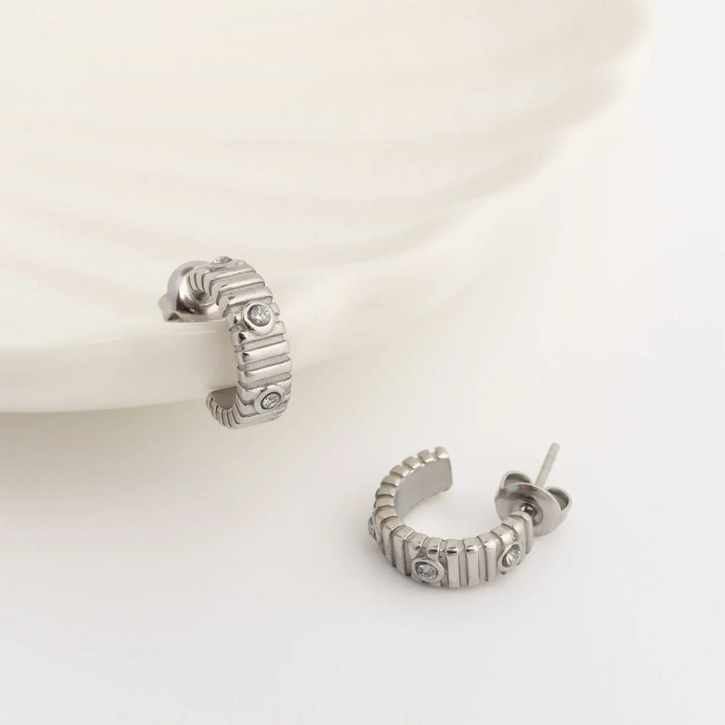 The Coliseum Fluted Huggie Earrings
