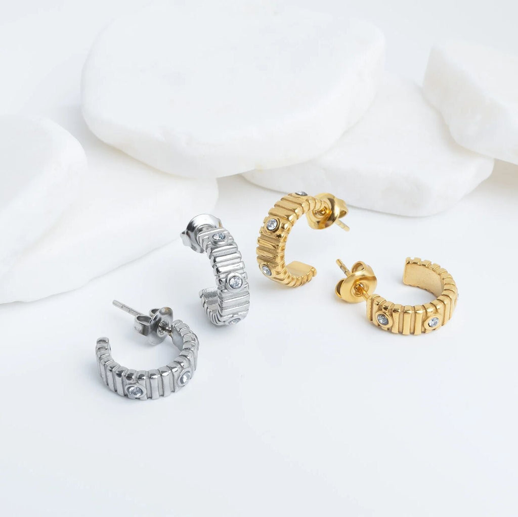 The Coliseum Fluted Huggie Earrings