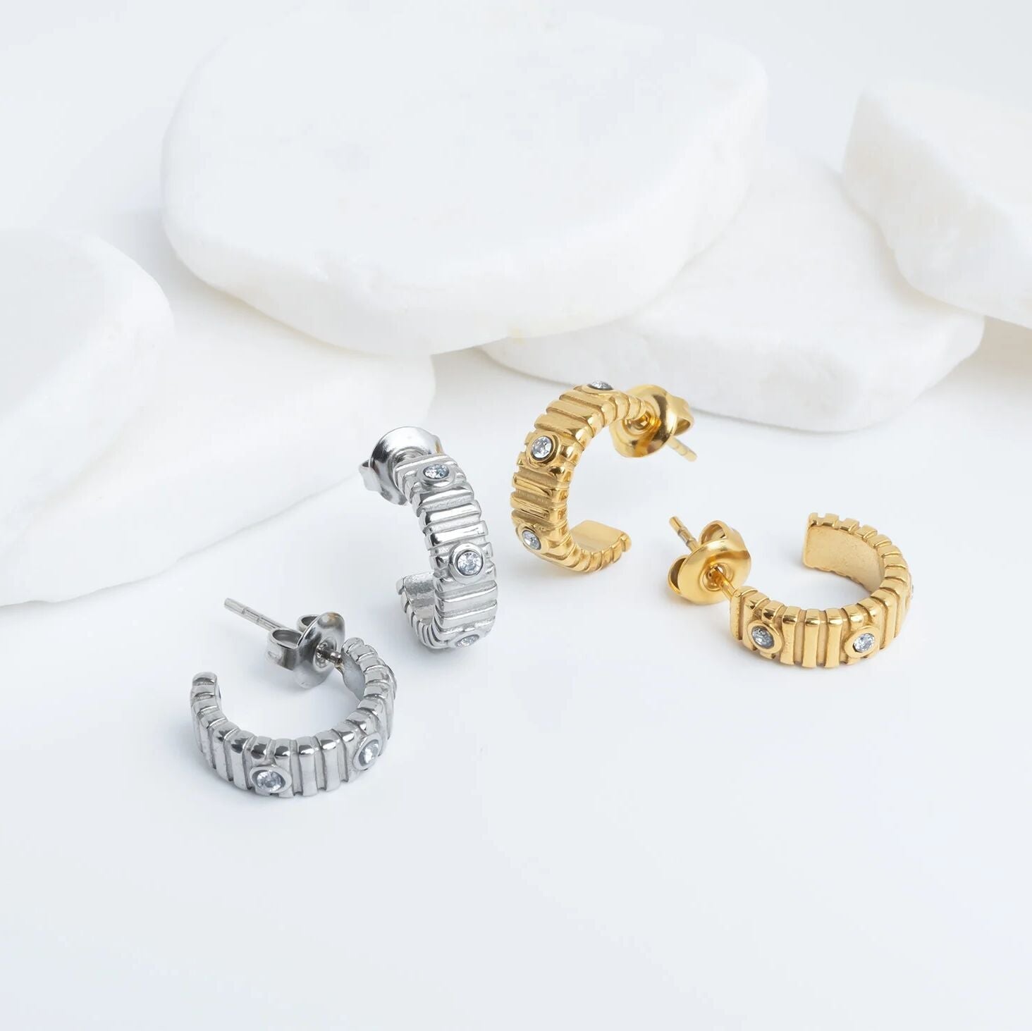 The Coliseum Fluted Huggie Earrings