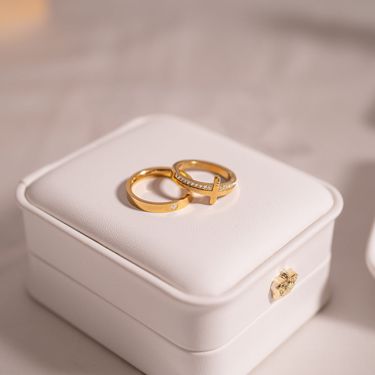 Cathedral Cross Ring with Stones, a gold cross ring set with cubic zirconia stones, from Garden District Jewelry — product photo 11 of 11.