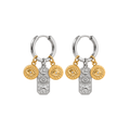 A pair of silver and gold hoop earrings with dangling eye and sun motif charms, shown on a plain white background.